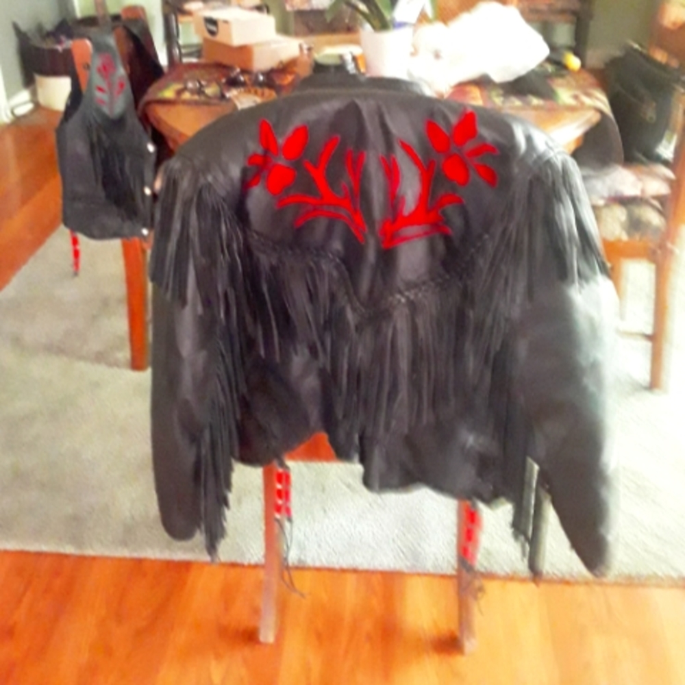 Medium leather coat with roses